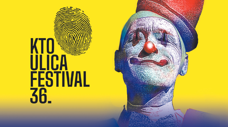 portret uśmiechniętego klauna z przymkniętymi oczami, motyw związany z Festivalem ULICA, na żółtym tle. Z lewej strony napis KTO Ulica Festival 36.